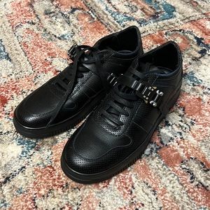 Buckled performance leather black sneakers